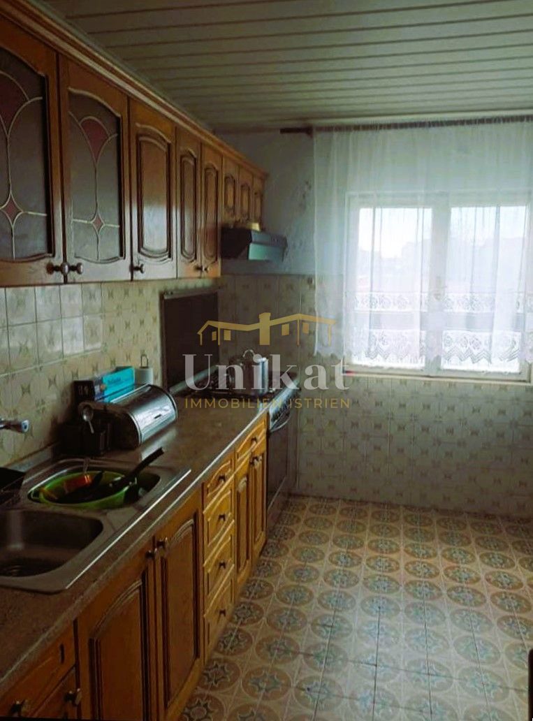 Casa bifamiliare in pietra abitabile, da ristrutturare